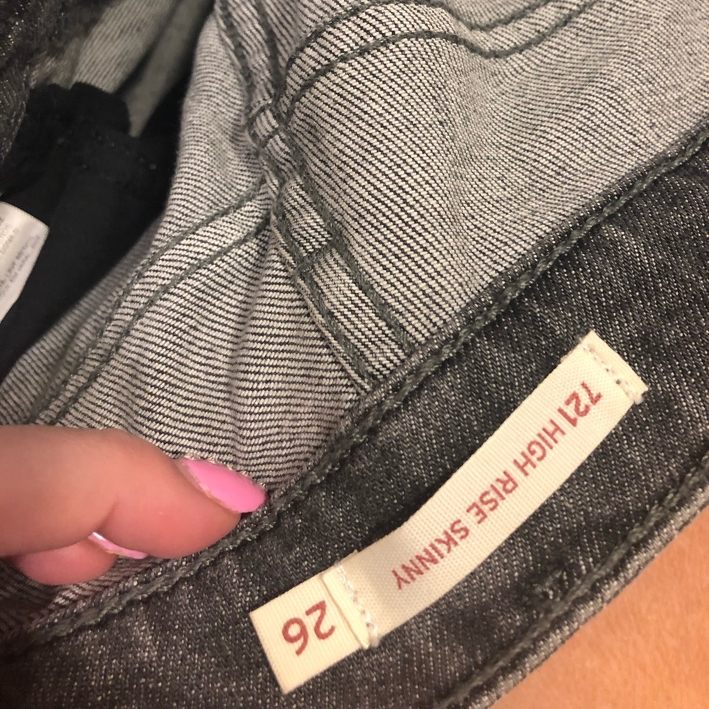 Grey Levi’s jeans